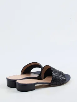 Damen Andrea Puccini – Mules aus Flechtleder in Schwarz