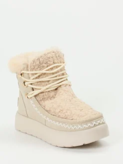 – Stiefelette aus Metallic mit Kunstfell*CAFèNOIR Discount