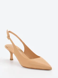 – Slingpumps aus Lackleder*Konstantin Starke