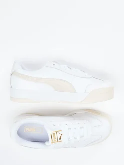 Damen Puma – Sneaker aus Glattleder in mit Goldakzenten