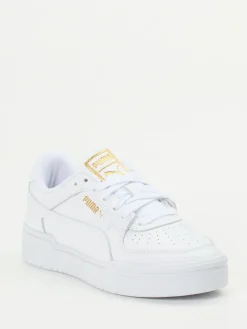 Damen Puma – Sneaker aus Glattleder mit Goldakzenten