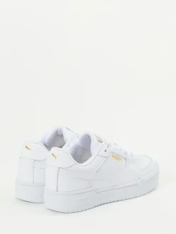 Damen Puma – Sneaker aus Glattleder mit Goldakzenten